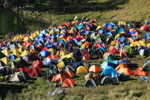 hillside full of tents